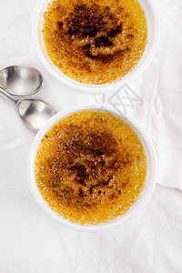 法国甜点     奶油布丁 烧焦霜刀具烹饪三位一体食物盘子模子勺子餐厅糕点蛋黄图片