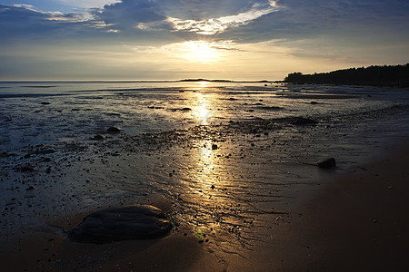 海上日落天空晴天反射海滩阳光海浪旅行蓝色海岸海洋图片