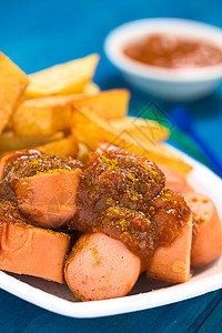 德国快餐 叫Curdyworst食物粉末盘子土豆薯条猪肉香肠小吃油炸图片