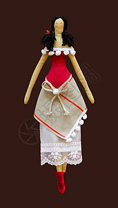 身着乌克兰民俗服装的手工制造的孤立娃娃女孩数字玩具纺织品刺绣针织模型艺术线程编织靴子图片