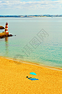 海滩天空海洋徽标海岸灯塔海岸线旅游海湾波纹港口图片