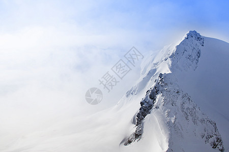 山峰峰首脑环境童话滑雪天空阳光季节天气日出假期图片