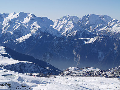 雪山顶峰首脑岩石假期季节环境悬崖滑雪天空旅行图片