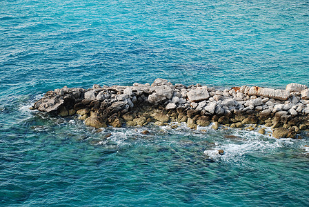 与海滩的交接岩石海洋海岸线假期背景图片