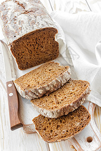 面包饼面粉乡村饮食小麦芝麻木头玉米烹饪营养面包图片