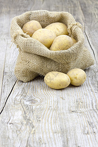 土豆生土豆 包装布袋中市场解雇马铃薯收成生产淀粉麻布烹饪蔬菜鱼种图片