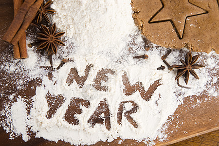 面粉上的刻记     新年甜点食谱美食传统数字勺子厨房厨师桌子巧克力图片