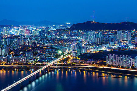 从顶峰开始的首尔天际城市团伙日落风景住宅建筑交通通道踪迹景观图片