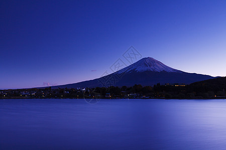 富士山顶峰阳光日落积雪冰镇公吨植物火山图片