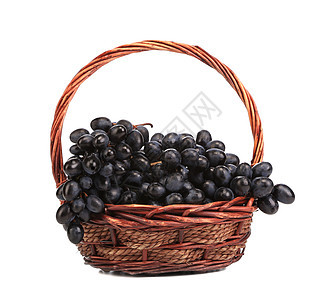 黑熟的葡萄在篮子里收成水果藤蔓柳条蓝色紫色植物美食栽培葡萄园图片