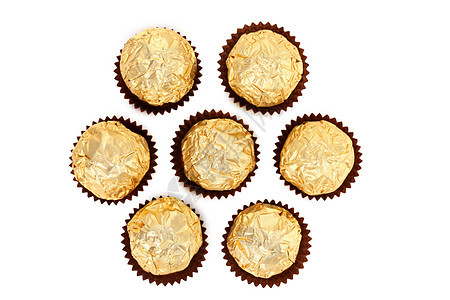 一堆圆形巧克力甜点飞碟白色糖果松露食物饼干糕点背景图片