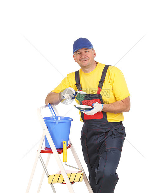 工人在梯子上加茶杯劳动成人工具服务螺丝刀安全帽建筑机械职业男人图片
