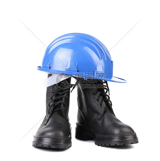 坚硬的帽子和工作靴子蓝色工业齿轮预防黑色衣服安全帽职业头盔工具图片