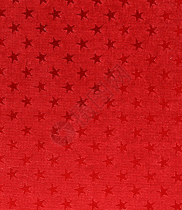红色背景的星号黑色冲压印象织物装饰品背景图片