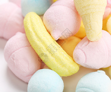 冰淇淋形式的棉花糖奶油绿色水果粉色孩子童年垃圾糖果黄色团体图片