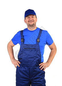 穿蓝制服的工人建筑工业白色机械蓝色工作腰部靴子身体帽子图片