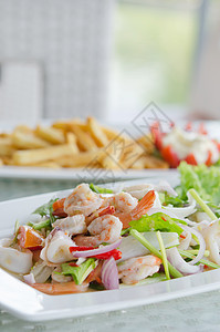 泰国辣辣沙拉营养红色盘子蔬菜美食食物胡椒海鲜乌贼洋葱图片