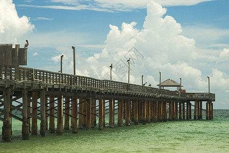 码头旅游柱子海滩摄影天空结构栏杆地平线建筑海洋图片