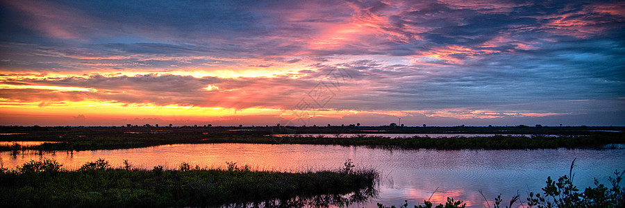 日落橙子目的地水平海洋场景全景天空摄影反射沼泽地图片