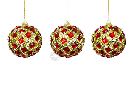 圣诞树玩具 红黄球在白色的背地上图片