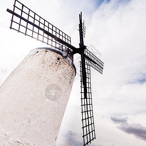 拉曼查的风车地标场地乡村旅行农场旅游天空农村建筑学房子图片
