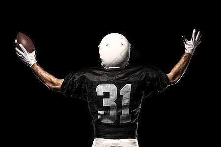 足球运动员黑色体育场竞技男人制服男性头盔运动垫肩白色图片
