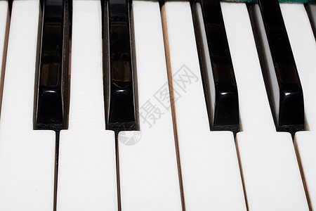 钢琴笔记旋律乐器声学钥匙黑色乌木白色音乐会艺术背景图片