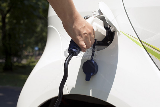 电动汽车充电方式电源电源线喷嘴人手收费插头汽车工业马达电动车图片