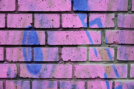旧墙上涂着色彩多彩的涂鸦街道石头艺术创造力背景图片