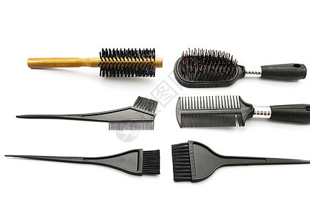 白色背景上不同的头发笔 B刷子木梳理发卫生塑料化妆品发型梳子头发护理图片