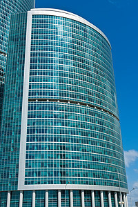 现代系统扩张者反射房子景观建筑玻璃蓝色天空城市场景太阳图片