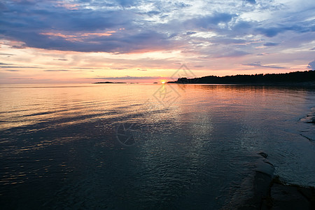 海上日落海洋阳光海岸海滩晴天旅行橙子地平线假期天空图片