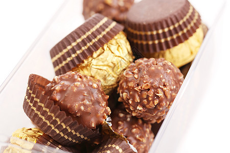 一堆圆形巧克力甜点飞碟食物白色糕点糖果松露图片