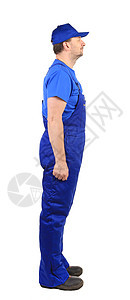 穿蓝制服的工人 侧面风景靴子劳动机械蓝色服务腰部管道职业工业男人图片