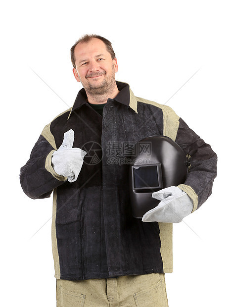 戴面罩的焊接器在手里焊机工作职业男性帽子手套金属衣服工具男人图片
