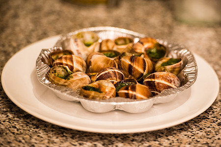 贴近有大蒜黄油的埃斯加高地服务午餐文化美食田螺蜗牛餐厅饮食螺旋食物图片