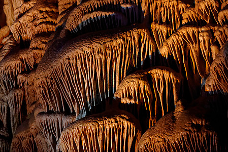 以色列索雷克洞穴的石灰岩炼油形状数字雕塑橙子岩石梳子石头钟乳石滴水爪子布料图片