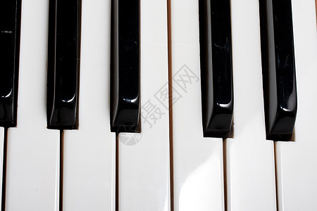 钢琴乐器音乐会笔记白色象牙声学黑色键盘艺术旋律图片