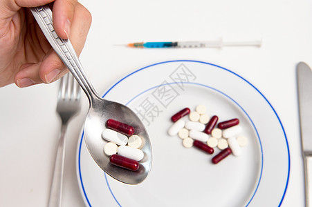 医药用药和餐桌白色菜单药剂药品午餐止痛药疾病药片勺子剂量图片