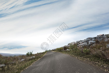 通往地平线的道路灌木环境晴天岩石天空绘图计算机阳光多云图片