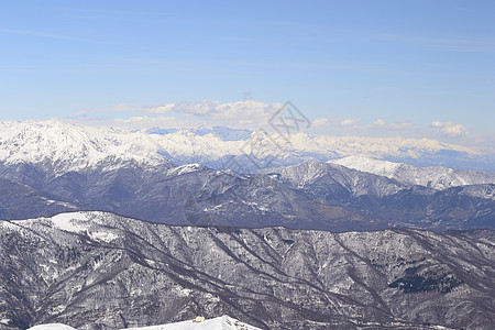 白滑雪斜坡冰川运动全景阳光蓝色季节天空山脉勘探山峰图片