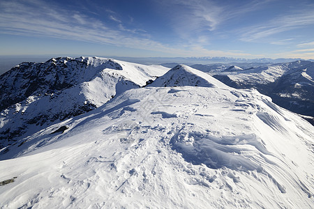 白滑雪斜坡天空冰川运动勘探山峰山脉季节蓝色阳光风景图片