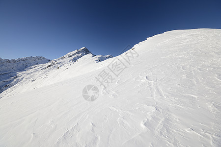 后国家滑雪勘探寂寞运动自由活动天空季节风景粉雪冰川蓝色图片
