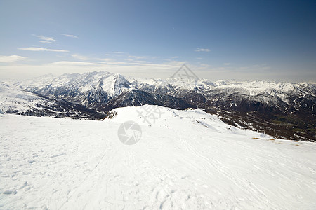 阿尔卑山滑坡山脉粉雪山峰偏光片运动滑雪勘探冰川天空季节图片