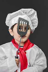 烹饪 小男孩在厨房准备健康食物 在灰色和灰色之间厨师蔬菜乐趣微笑围裙孩子面粉饮食童年午餐图片