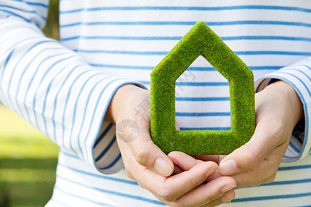 持有手持绿屋图标概念节约房子绿色活力花园建筑生态环境财产图片