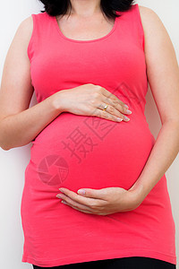 孕妇触摸其肚子手臂分娩父母女性怀孕生活药品手指女士胸部图片