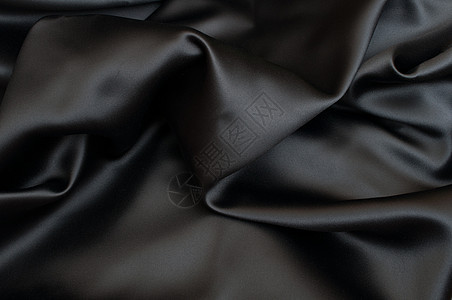 丝绸背景奢华黑色材料涟漪波浪状窗帘纺织品织物海浪衣服图片