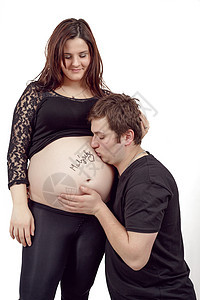 与丈夫一起生活着幸福的一对夫妇夫妻男人男性女士怀孕女性工作室妻子肚子母性图片