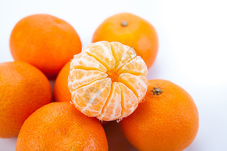 成熟的水果橘子橙子柑桔宏观白色图片